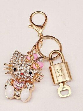 Authentic Louis Vuitton Gold Lock 🔒 Keychain Bag Unbranded Hello Kitty Charm LV